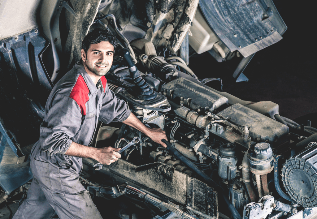 Truck and trailer mechanic repairing a truck